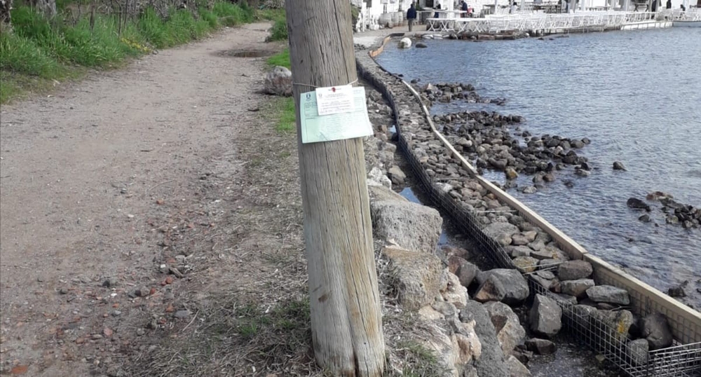 1. derece arkeolojik sit alanına duvar ördü