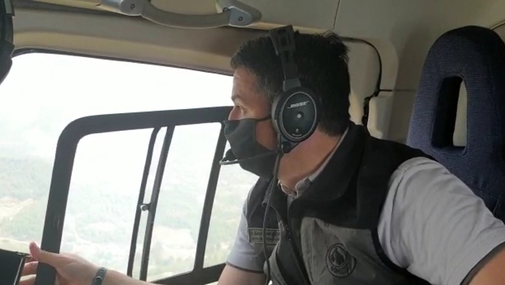 Bakan Pakdemirli, havadan ve karadan orman yangınını inceledi