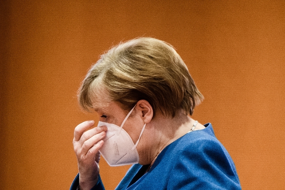 Merkel, mutasyon virüsün yayılmasını engellemek için seyahat yasağı getirmeyi hedefliyor