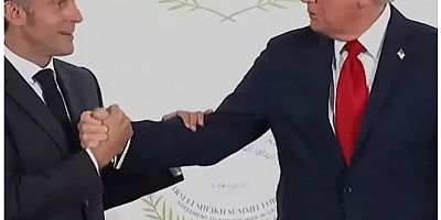 Trump ve Macron, ayaküstü birbirini tehdit etmiş! 